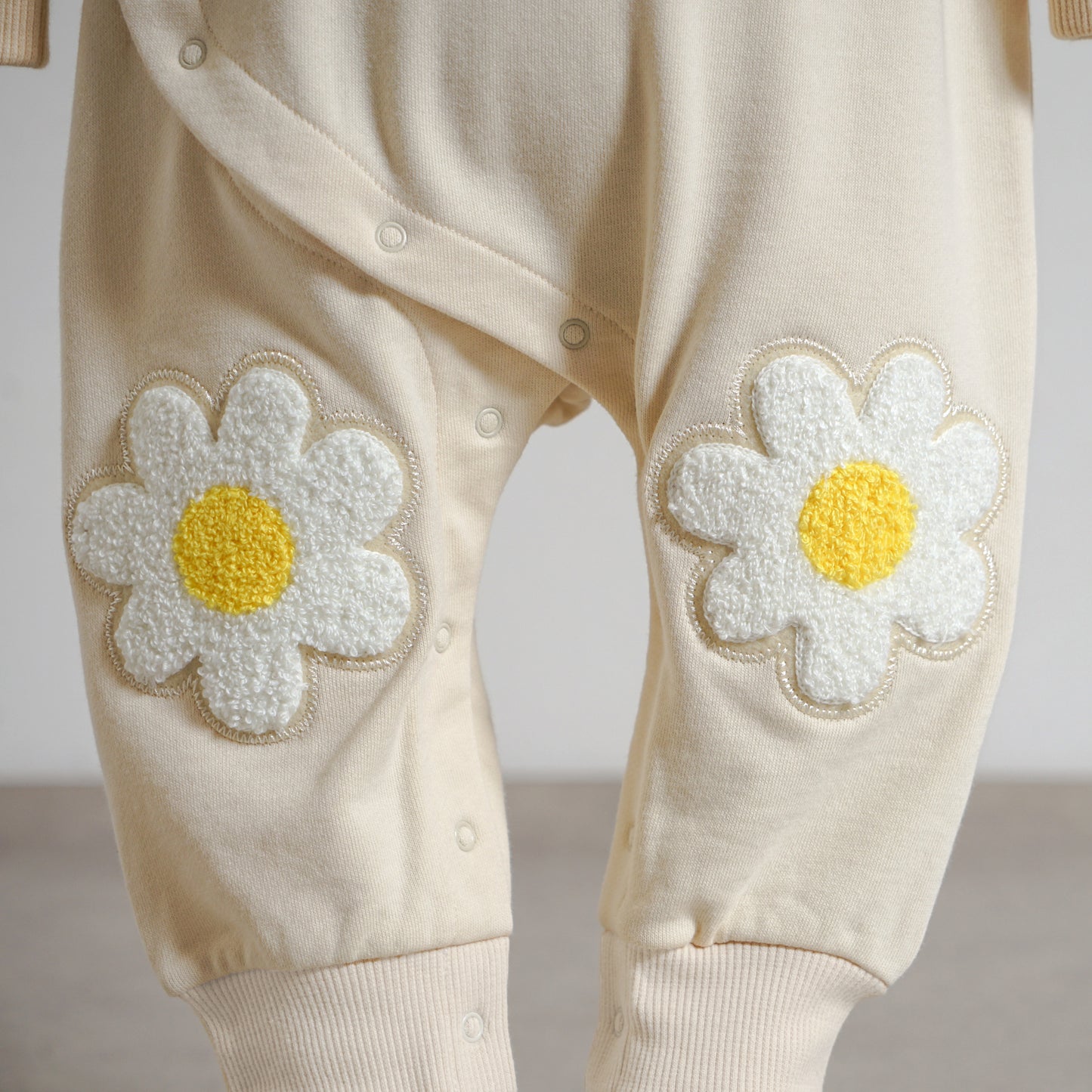 お花ワッペン裏毛ロンパース アイボリー 70・80cm