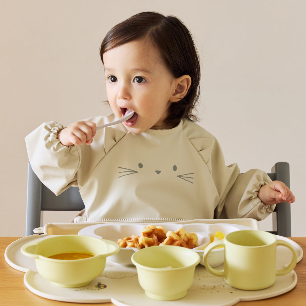 お食事ポーチロン 袖なし ねこアイボリー