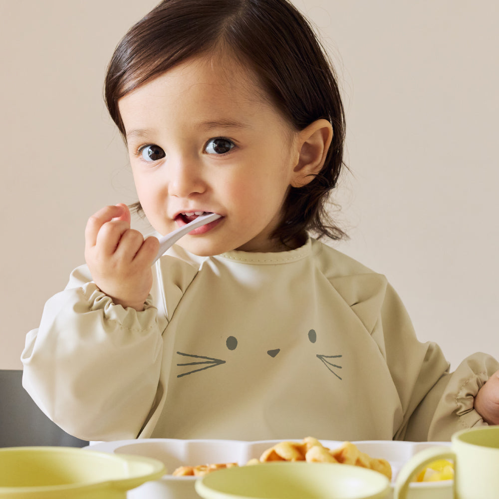 お食事ポーチロン 袖なし ねこアイボリー